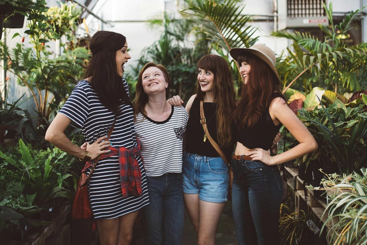 Group of friends smiling and talking