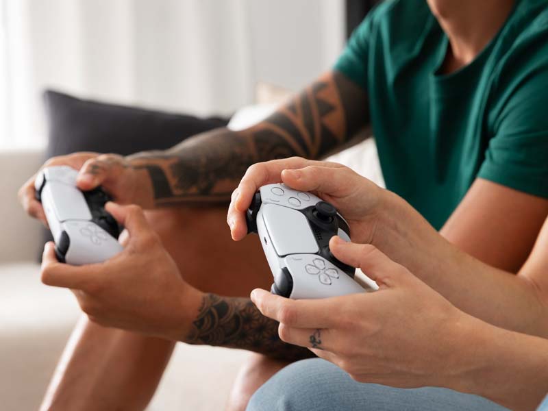 Two people playing playstation