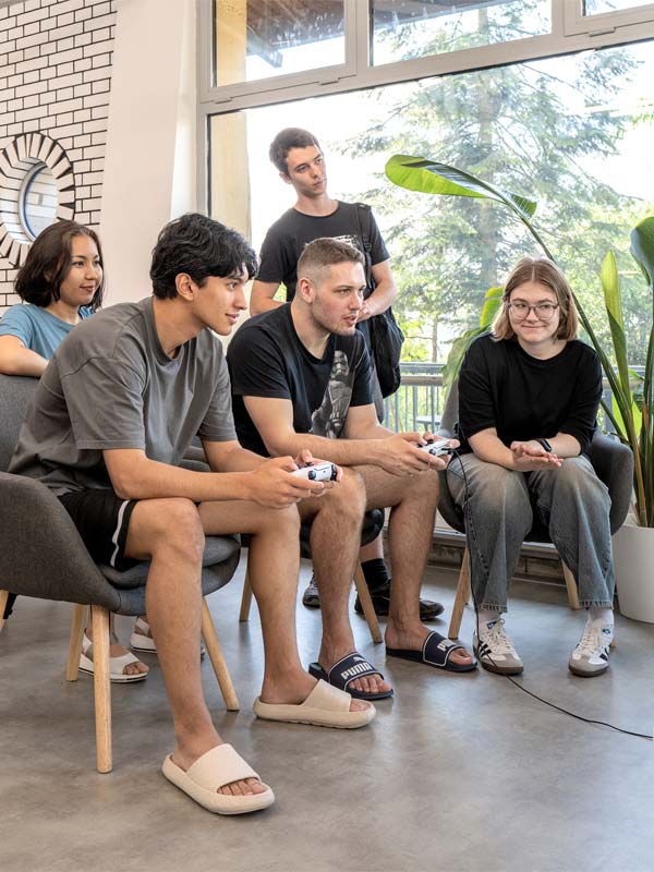 Group of friends playing playstation